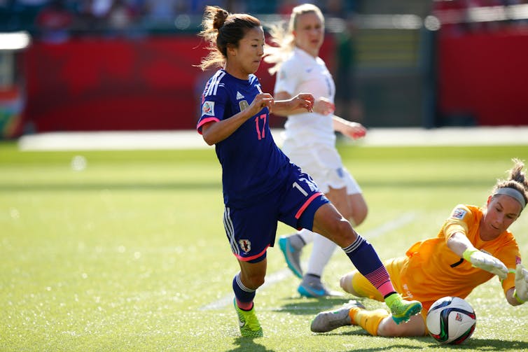 Japanese player Yuki Ogimi takes centre stage during a 29015 World Cup semi-final against England.