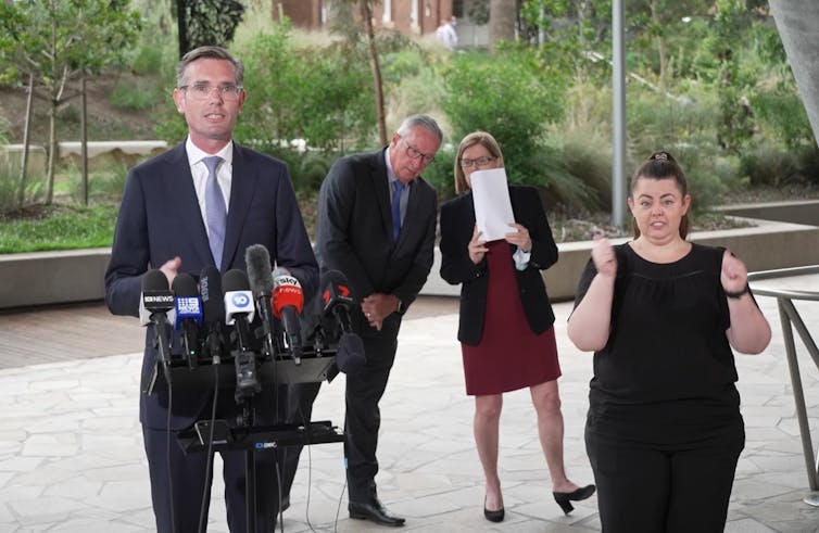 NSW's Premier Dominic Perrottet, health minister Brad Hazzard, chief health officer Kerry Chant at a press conference on January 18 2022.