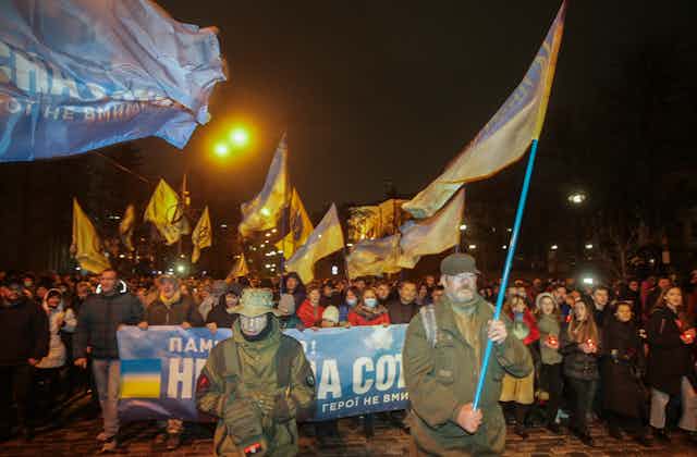 Ukranian naitonalists march through Kyiv with national flags