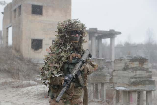 Ukrainian reservist soldier in camouflage at a training comound near Kyiv, December 2021.