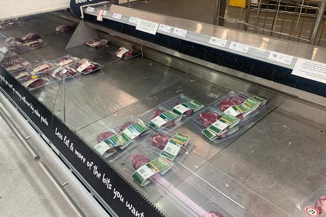 Empty shelves of meat products are seen at a supermarket in Sydney on January 12 2022.