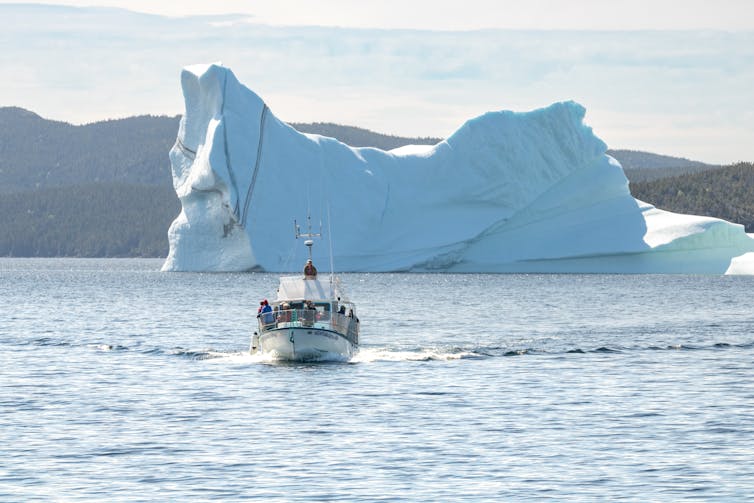 Iceberg near ship