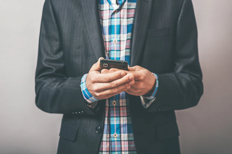 A man holding a mobile phone