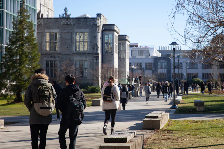 Students seen walking on a campus.