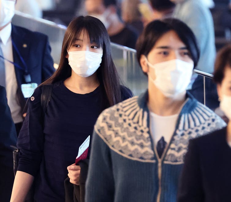 Former princess Mako (left) and her husband, Kei Komuro.