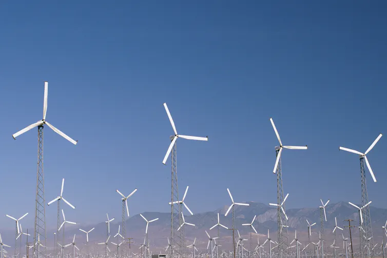 Countless wind turbines in a desert.