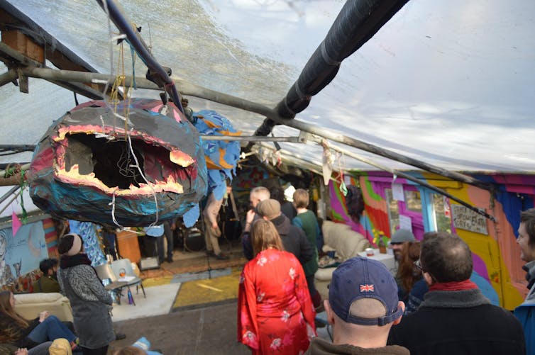 People standing in self-built space