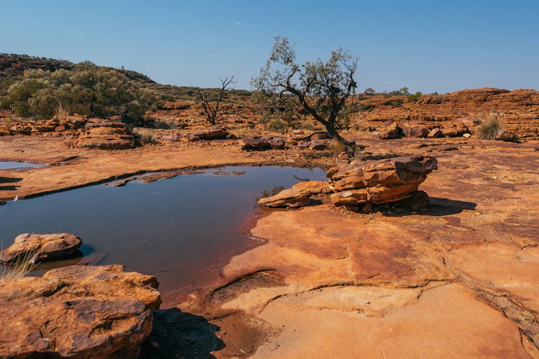 shallow pool in desert landscape