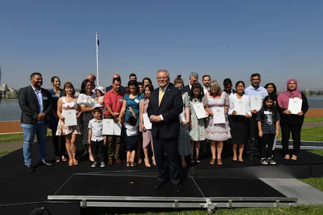 Prime Minister Scott Morrison with new citizens in 2020.