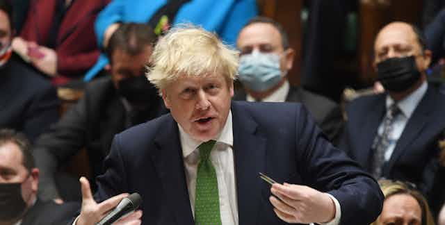 Boris Johnson speaks at House of Commons while gesturing dramatically