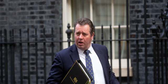 Chief Whip Mark Spencer walks on Downing Street