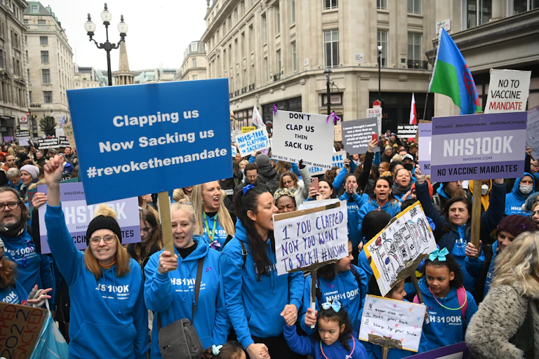 NHS workers protest mandatory COVID vaccination.