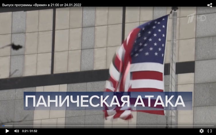 A picture of an American flag on which the Russian phrase 'panic attack' has been superimposed.