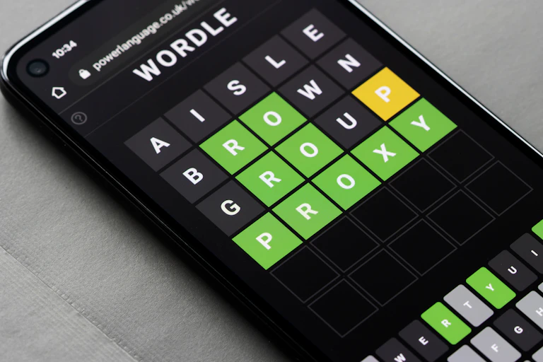 A smartphone displaying the Wordle game.