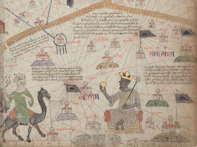 A man wearing a crown and holding a sceptre is approached by a man on a camel, against the backdrop of a map with lines and buildings.