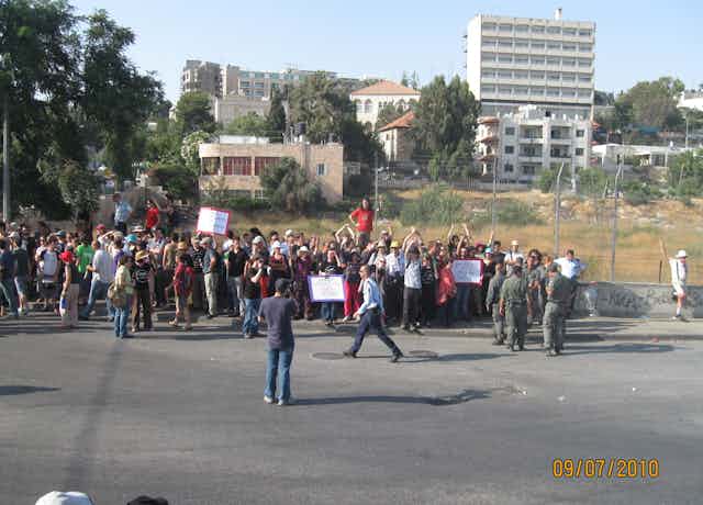 Palestinians demonstrate on the site of an eviction in East Jerusalem