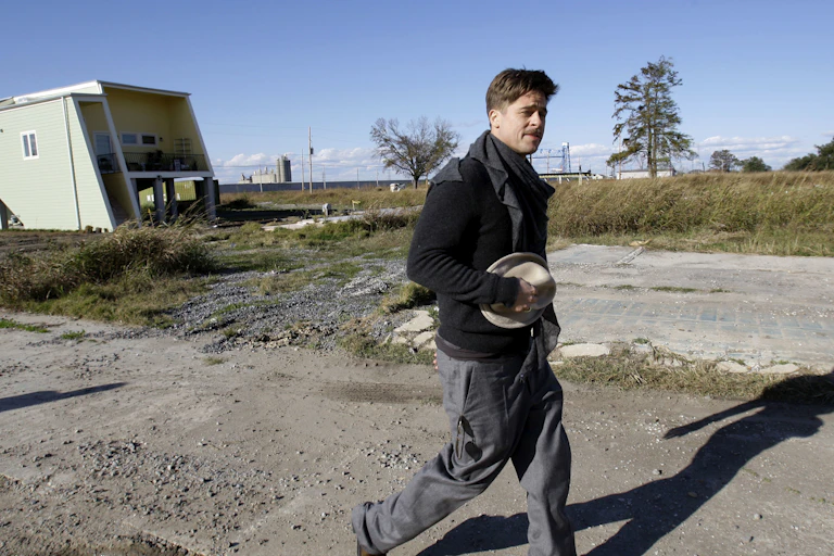 Brad Pitt, walking through a construction site