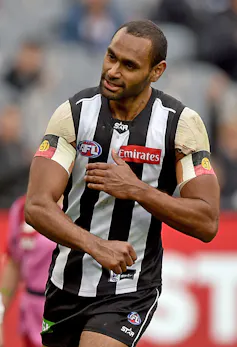 Travis Varcoe wears Aboriginal flags with Adam Goodes' number 37.