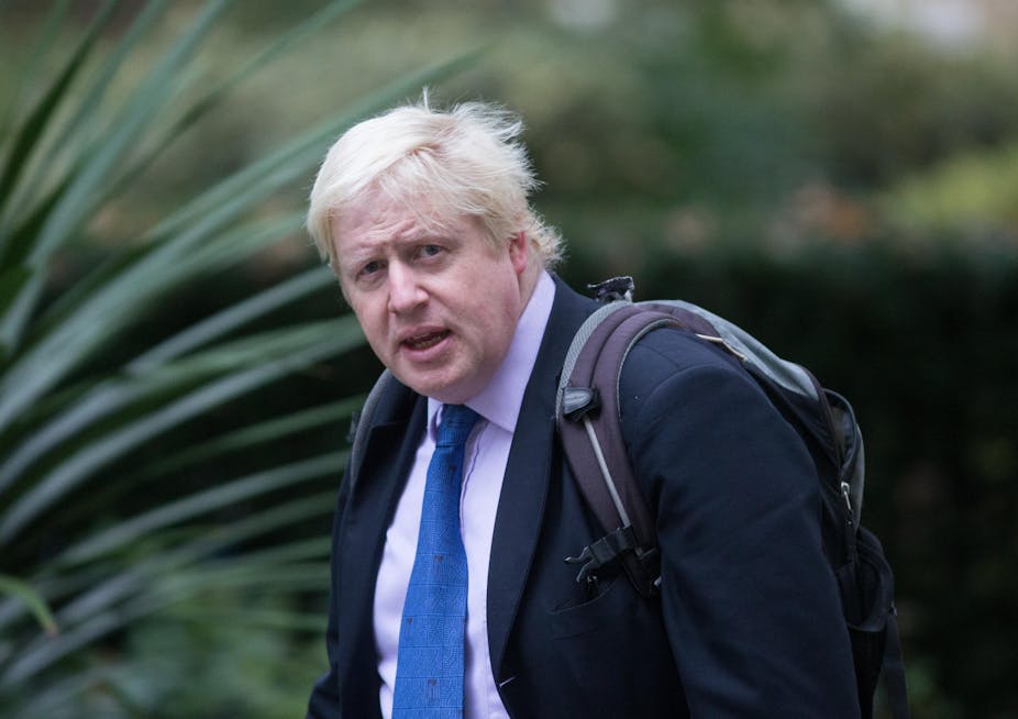 Boris Johnson wearing a rucksack
