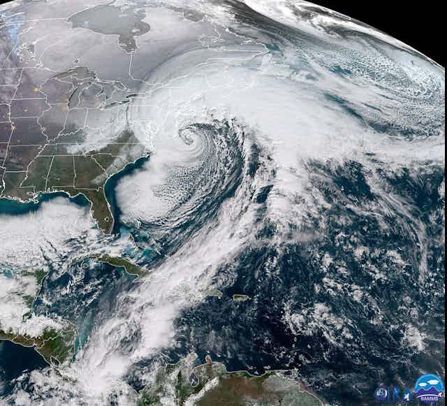 Large storm system spiraling counter-clockwise over the Eastern seaboard.