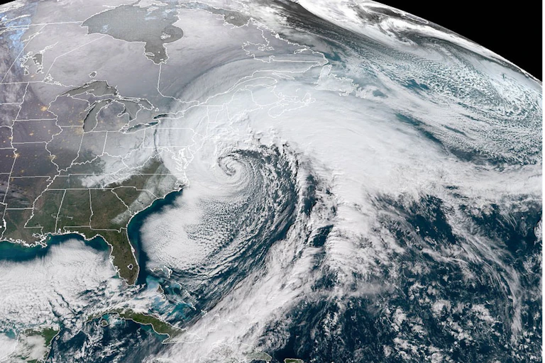 Large storm system spiraling counter-clockwise over the Eastern seaboard.
