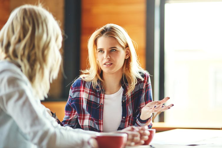 Two female friends talking