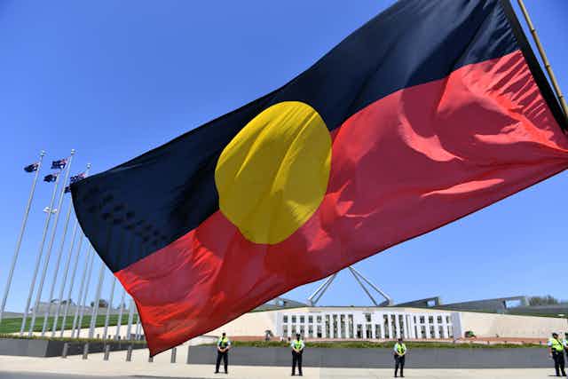 Aboriginal flag in front of Parliament House