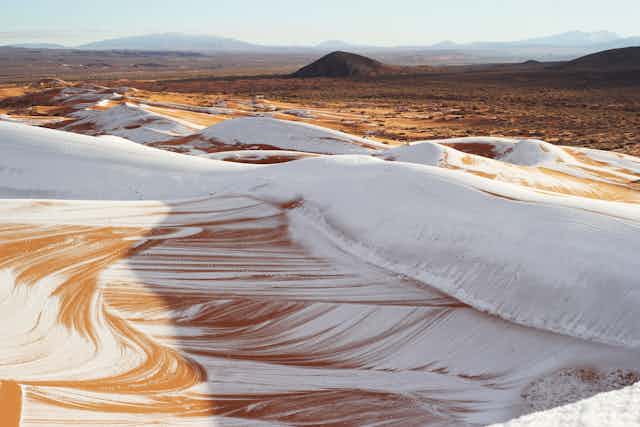 Sahara desert with a layer of snow