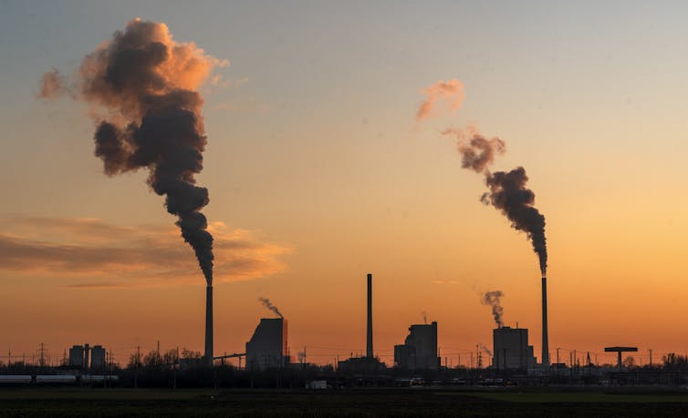 coal plant at sunset