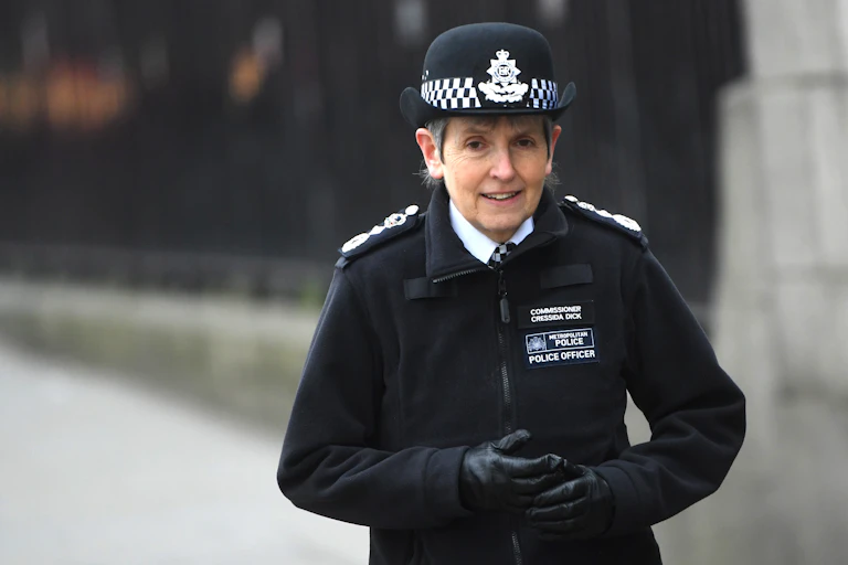 Met police commissioner Cressida Dick wearing a Met police uniform and walking outdoors