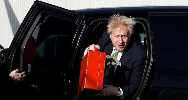 Boris Johnson exits car