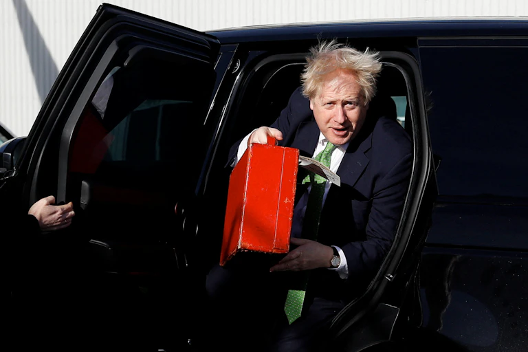 Boris Johnson exits car