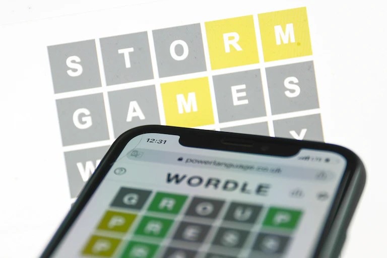 Grids featuring gray, yellow and green letters.