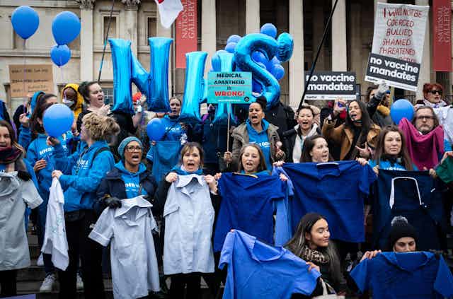NHS staff protesting against mandatory vaccines