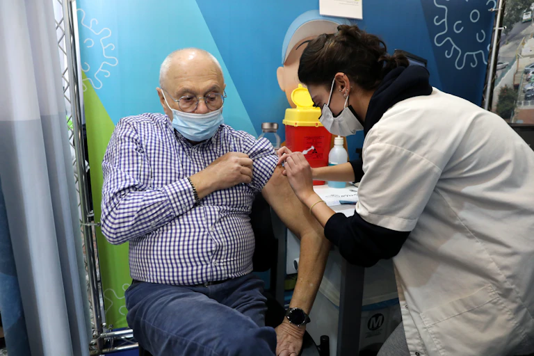 older man gets injection