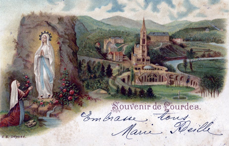 A vintage postcard shows the Catholic shrine at Lourdes, France.