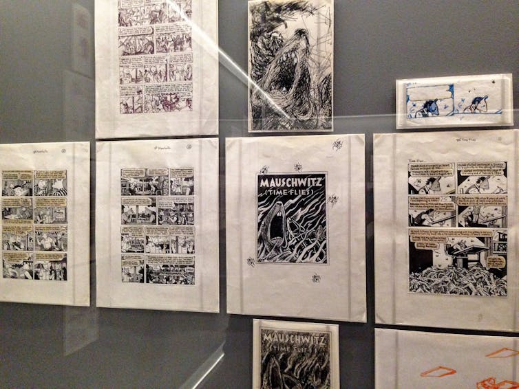 Black and white illustrated panels, including of a mouse surrounded by flames screaming.
