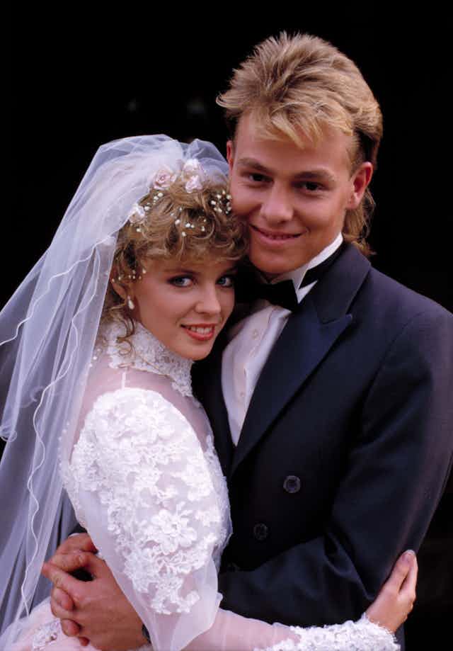 f Scott (right), played by Jason Donovan and Charlene, played by Kylie Minogue, tying the knot on Neighbours in the late 1980s