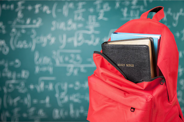 Bible in school bag.