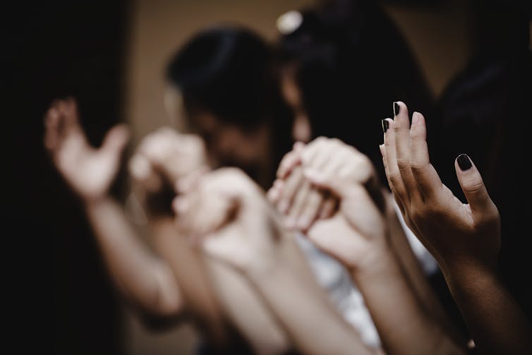 People praying.