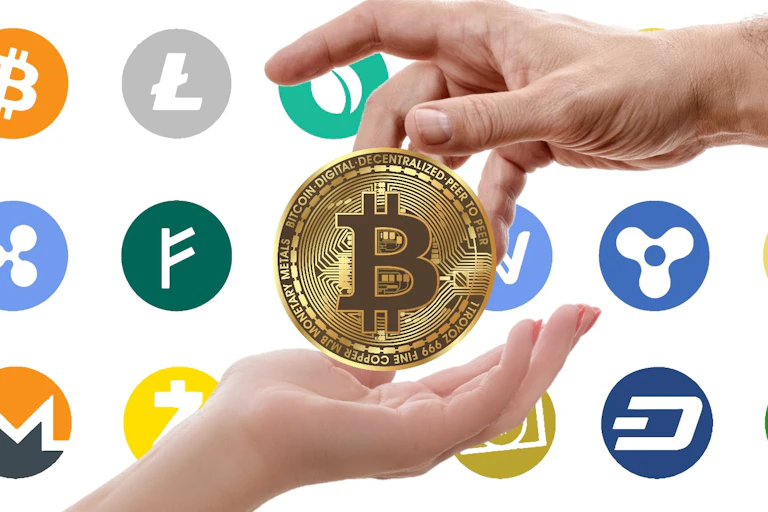 Two hands exchange a Bitcoin coin