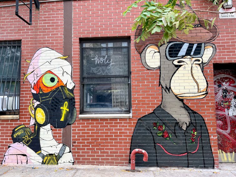 Two characters painted on a wall