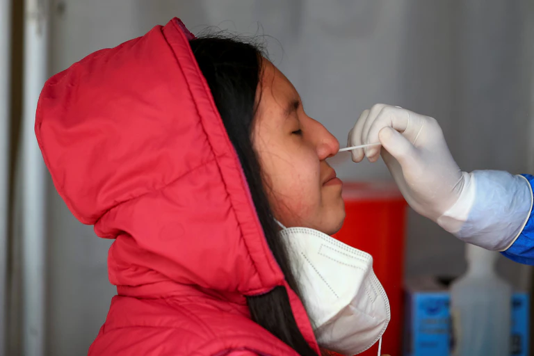 Person getting a COVID PCR test