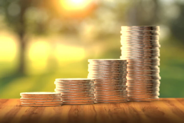 stacked coins on a table