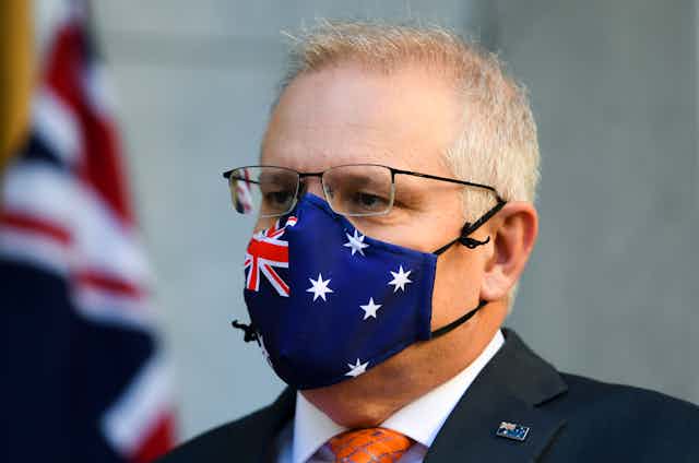 Man wearing an Australian flag face mask
