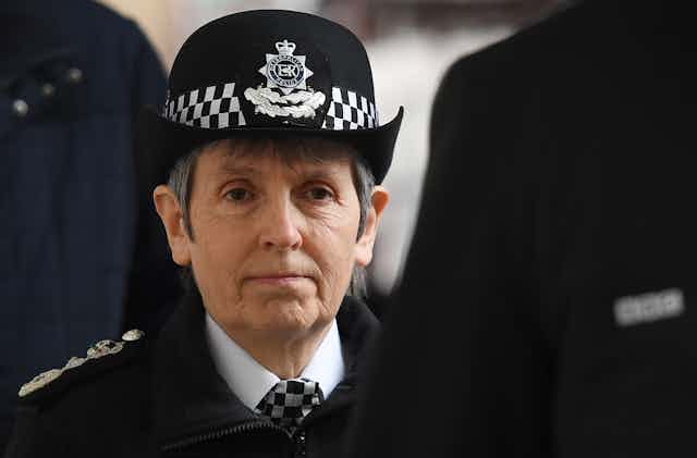 Close-up photo of Cressida Dick in Met police commissioner hat, with a neutral expression