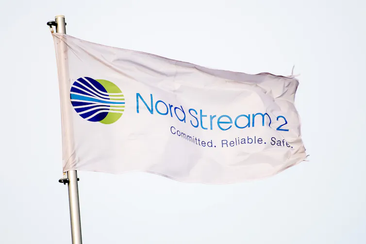 A flag bearing Nord Stream 2 logo.