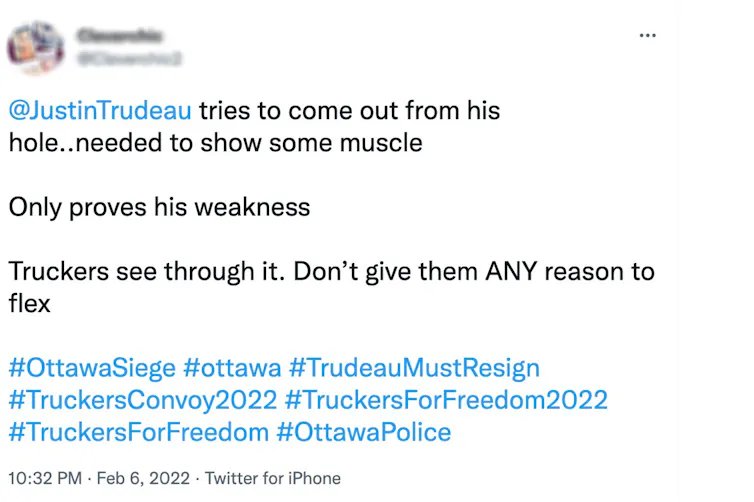 An image of a tweet with the name and face blurred out.