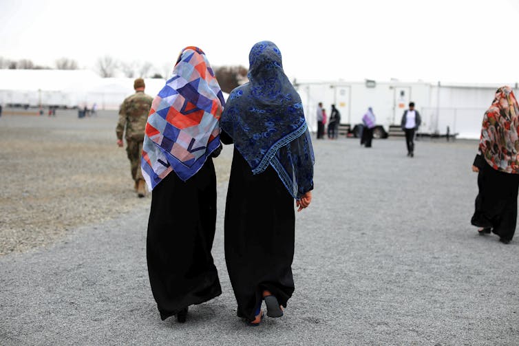 Refugees at a military base in the US.