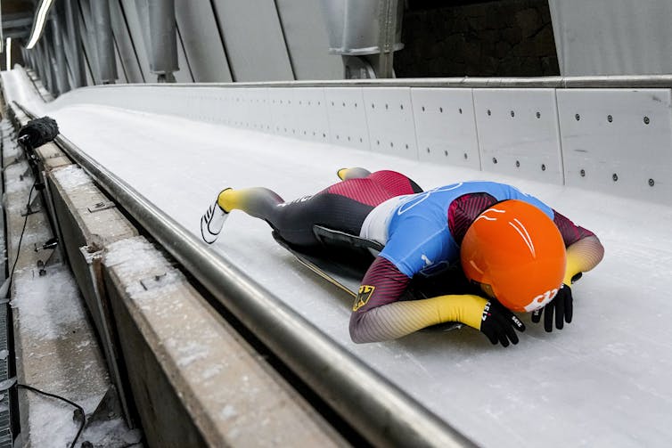 Skeleton competitor at the end of a run